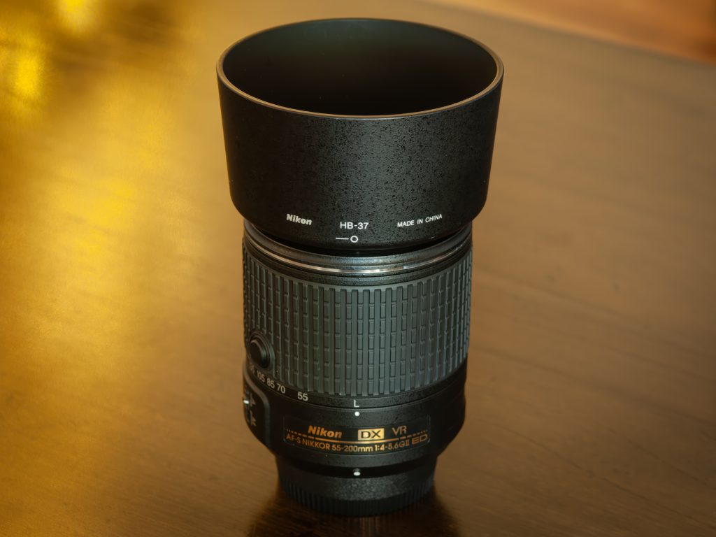 Nikon AF-S 55-200mm 1:4-5.6 G ED VR II lens - closed with hood